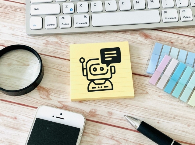 PCキーボードとチャットボットのイメージイラスト