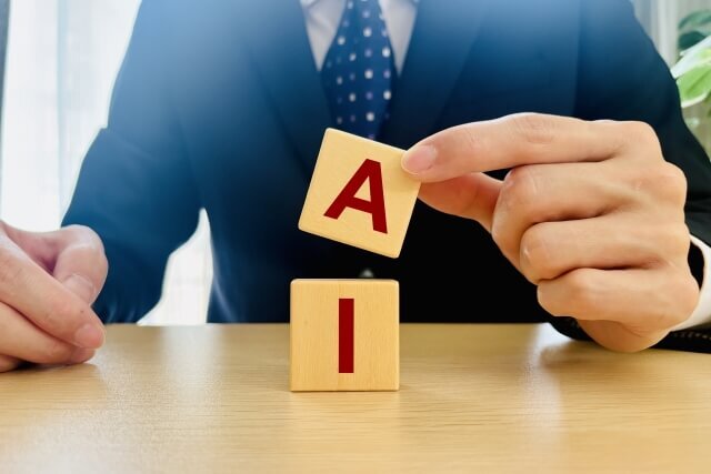 ブロックに描かれたAIの文字