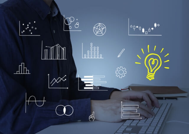 作業中の男性とグラフ